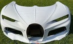 Náhradné dielce na Bugatti hravo zruinujú i milionára. Za panely na fotke máte dve nové Ferrari